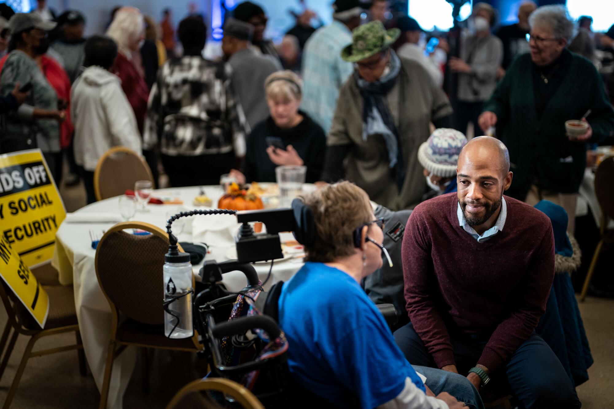 Democratic candidate for U.S. Senate Mandela Barnes greets attendees at a "Fish Fry to Save Social Security" event