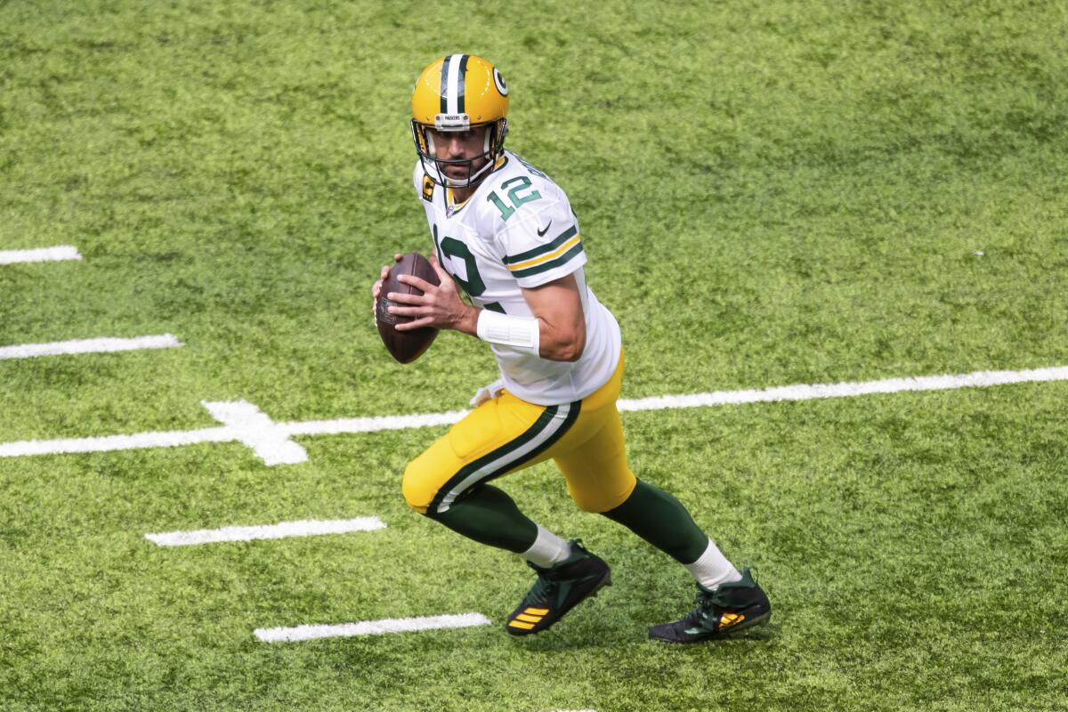 Green Bay Packers quarterback Aaron Rodgers looks to pass against the Minnesota Vikings on Sept. 13.