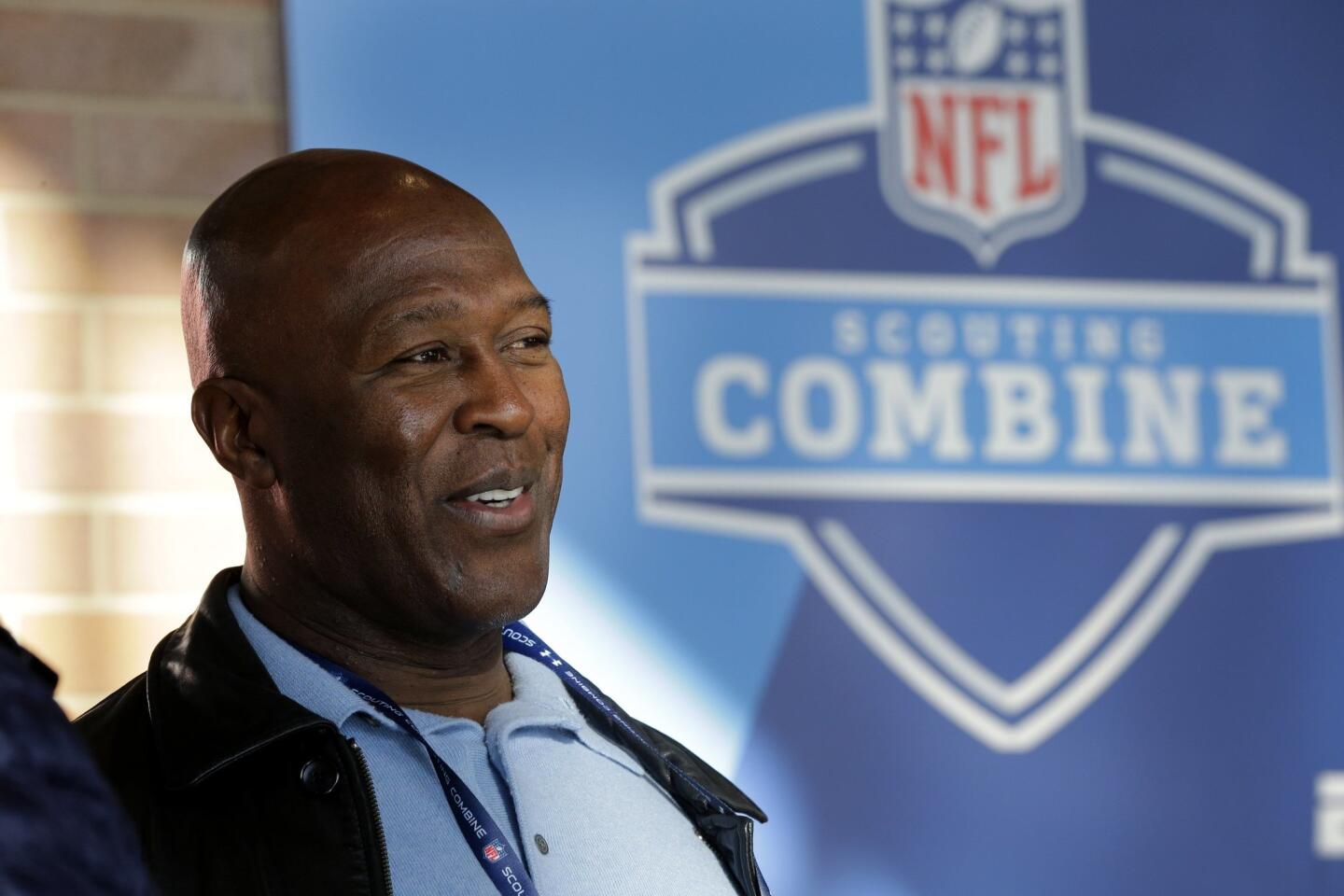 Buccaneers coach Lovie Smith waits for the start of a news conference at the NFL scouting combine in Indianapolis on Feb. 18, 2015.