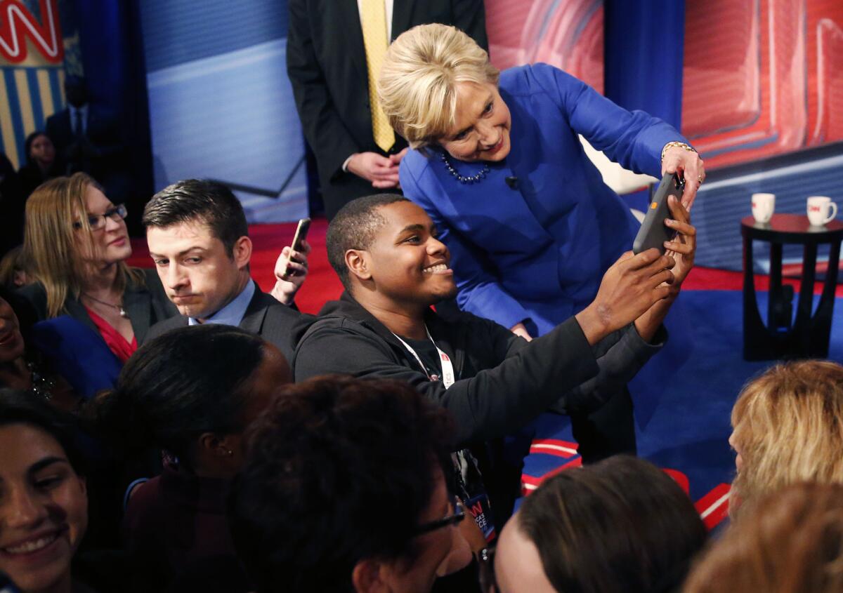 Hillary Clinton poses for photos with audience members after a CNN town hall event at the University of South Carolina School of Law in Columbia on Feb. 23.