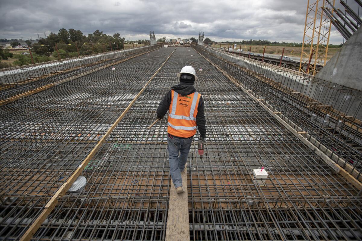Construction continues on the San Joaquin River Viaduct section of the California high-speed rail project in North Fresno.