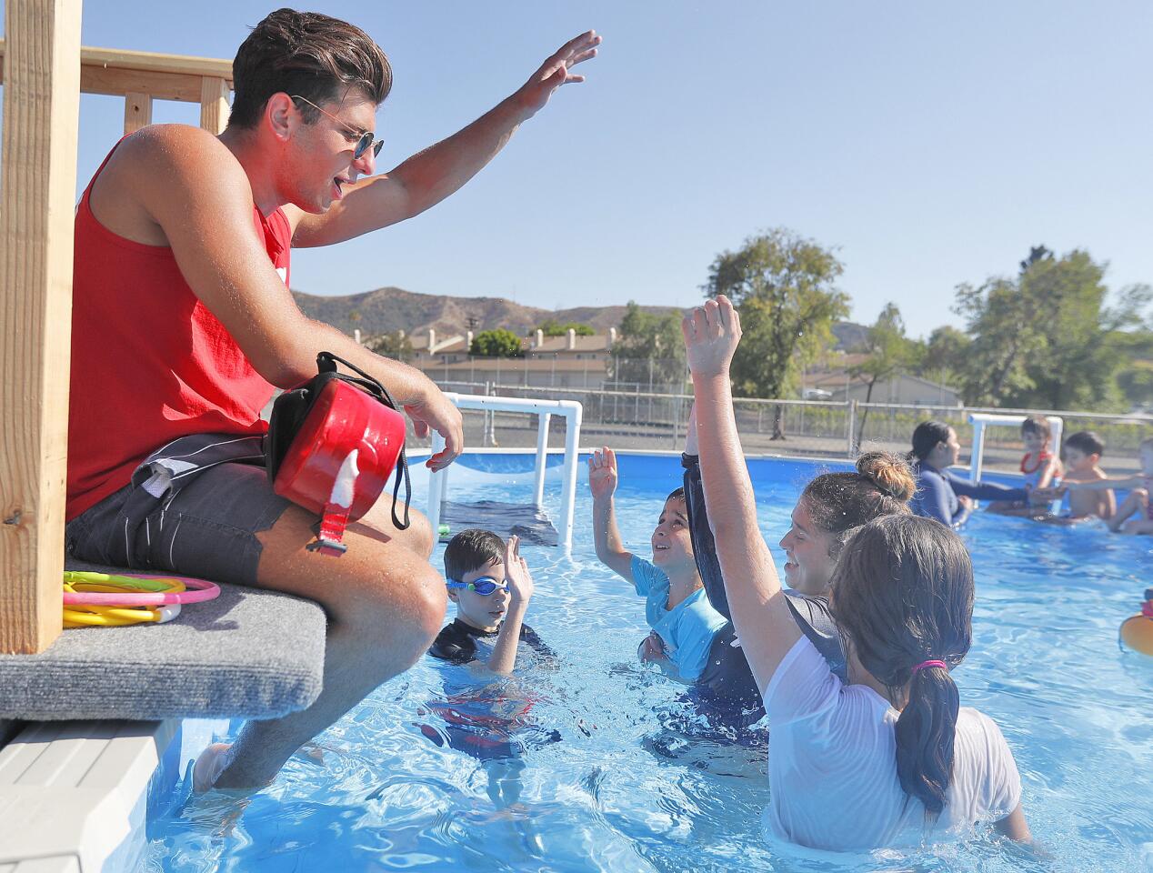 Photo Gallery: YMCA of the Foothills mobile pool at Sunland Elementary School to teach small children how to save their life