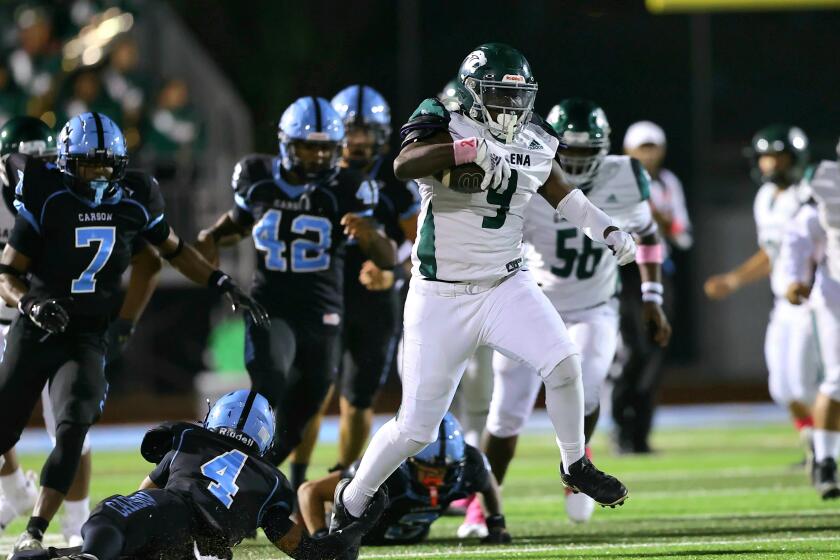 Gardena running back Xavier Grant takes off against Carson.