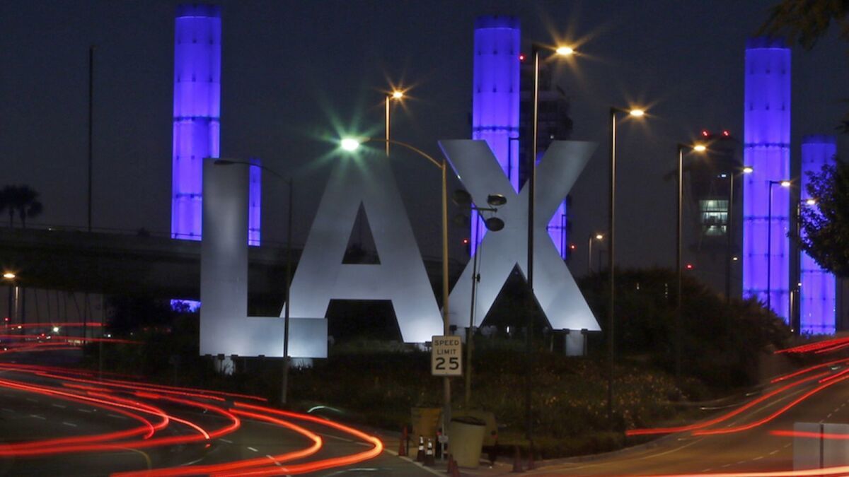 Snow would cover most of the 32-foot high letters at LAX.