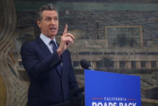 California Gov. Gavin Newsom takes part in a news conference at The Unity Council on Monday, May 10, 2021, in Oakland, Calif.