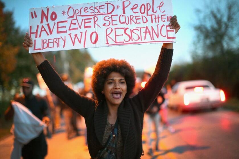 A demonstrator in Ferguson, Mo.