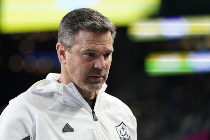 LA Galaxy coach Greg Vanney walks off the field following the first half of the team's MLS soccer match against the Seattle Sounders, Wednesday, Oct. 4, 2023, in Seattle. (AP Photo/Lindsey Wasson)