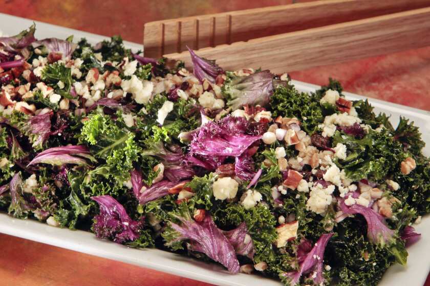 Kale Salad with farro, dried fruit and blue cheese.