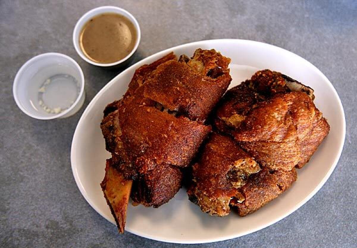 Crispy fried pata is served at the Happy Wok.