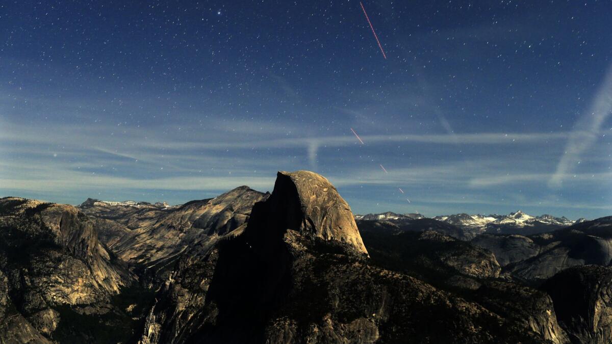 Lit by a half-moon, night becomes day during this 30-second time exposure view of Yosemite's Half Dome from a Glacier Point vantage point.