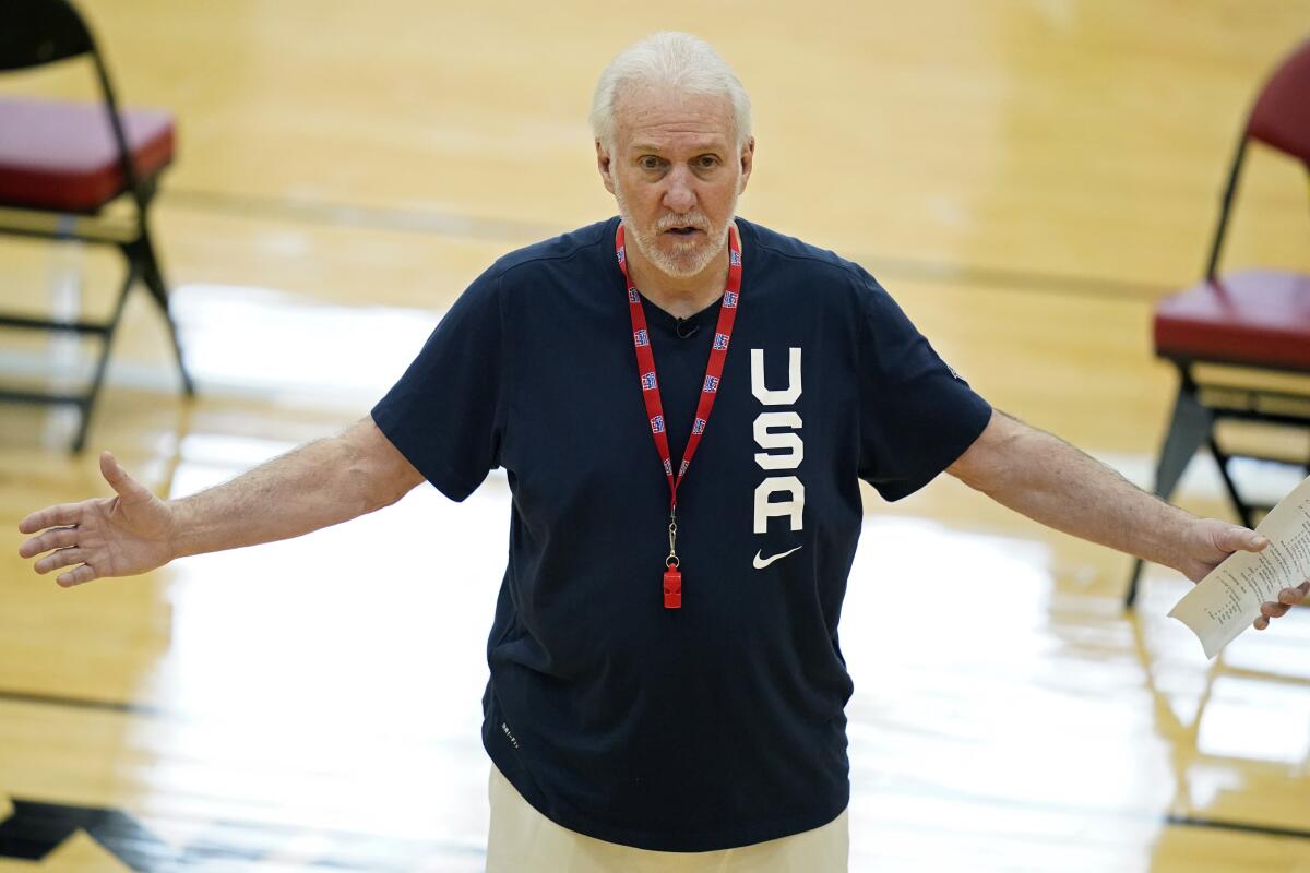 U.S. coach Gregg Popovich speaks with his players during training July 6 in Las Vegas.