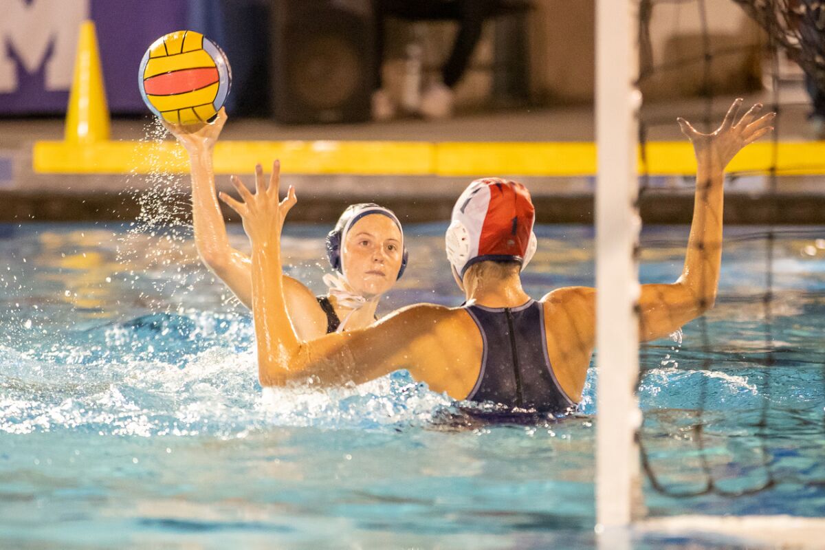 CdM's Abby Grace takes a shot against Yucaipa goalkeeper Christine Carpenter during Wednesday's match.