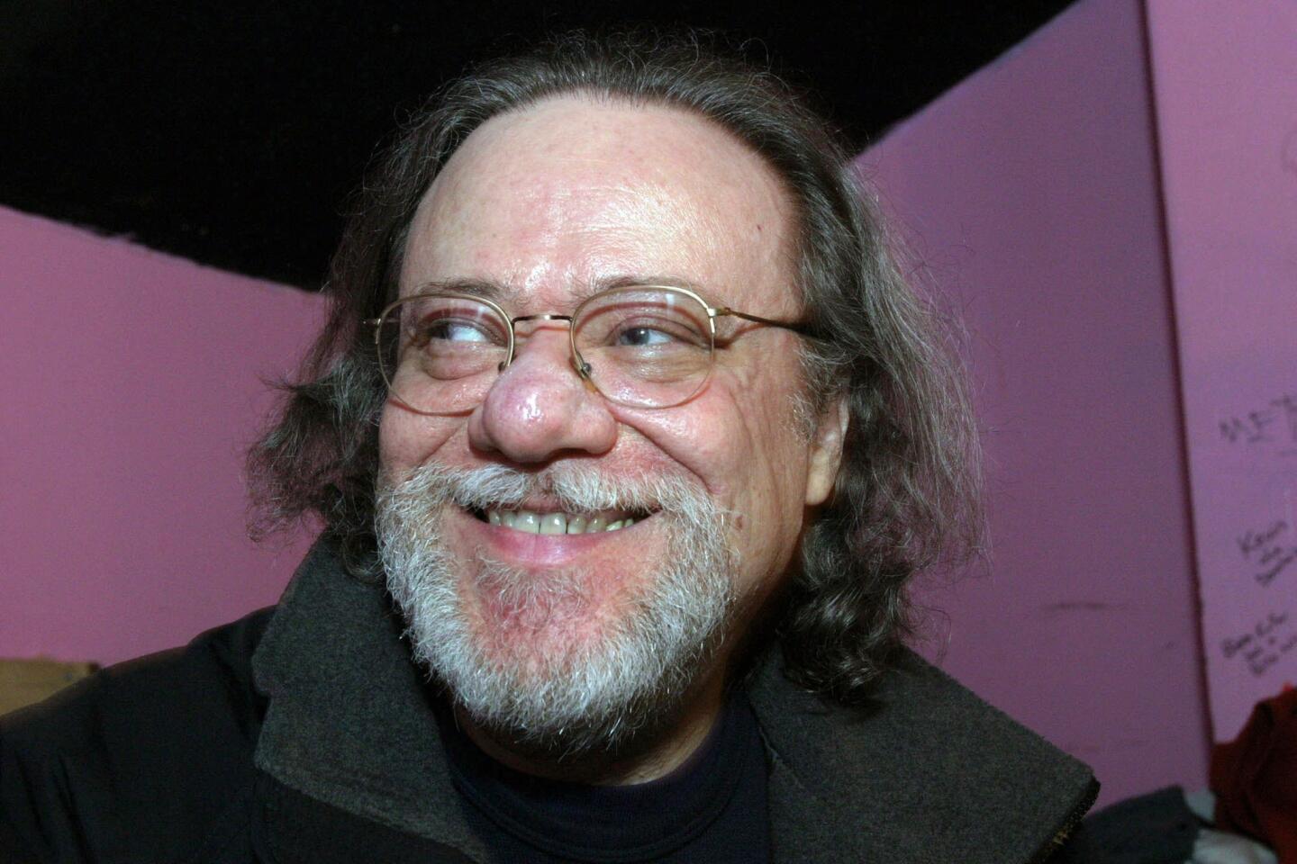 Tommy Ramone, former drummer for the Ramones, smiles during a backstage interview at the Knitting Factory in New York in January 2005.