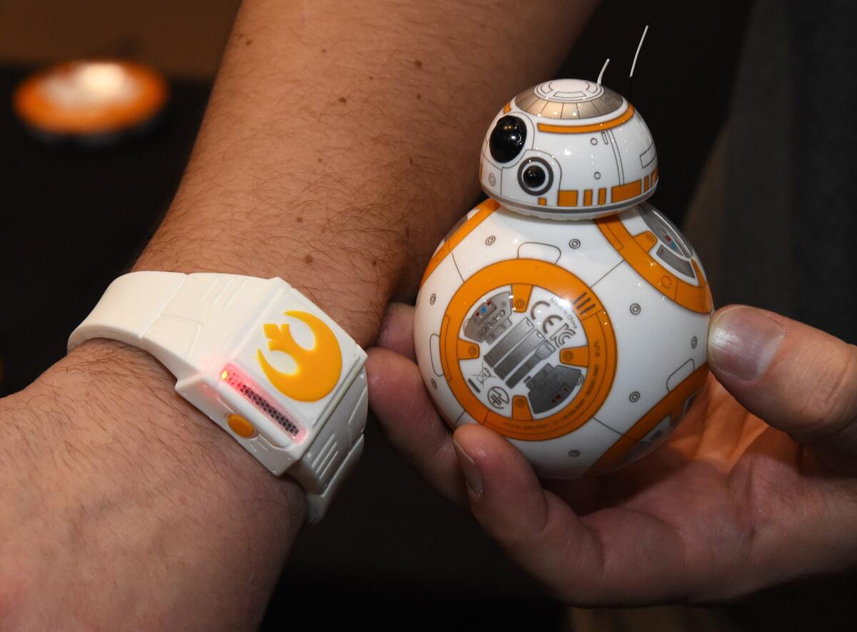 Sphero's BB-8 technical prototype robot and Force Band are displayed at the 2016 Consumer Electronics Show in Las Vegas.