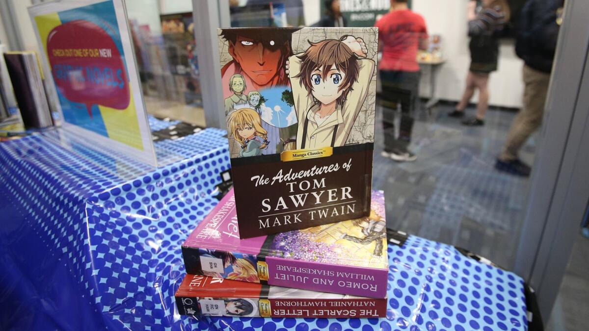 "The Adventures of Tom Sawyer" is displayed in graphic novel form during Fan Con on Thursday at Laguna Beach High School.