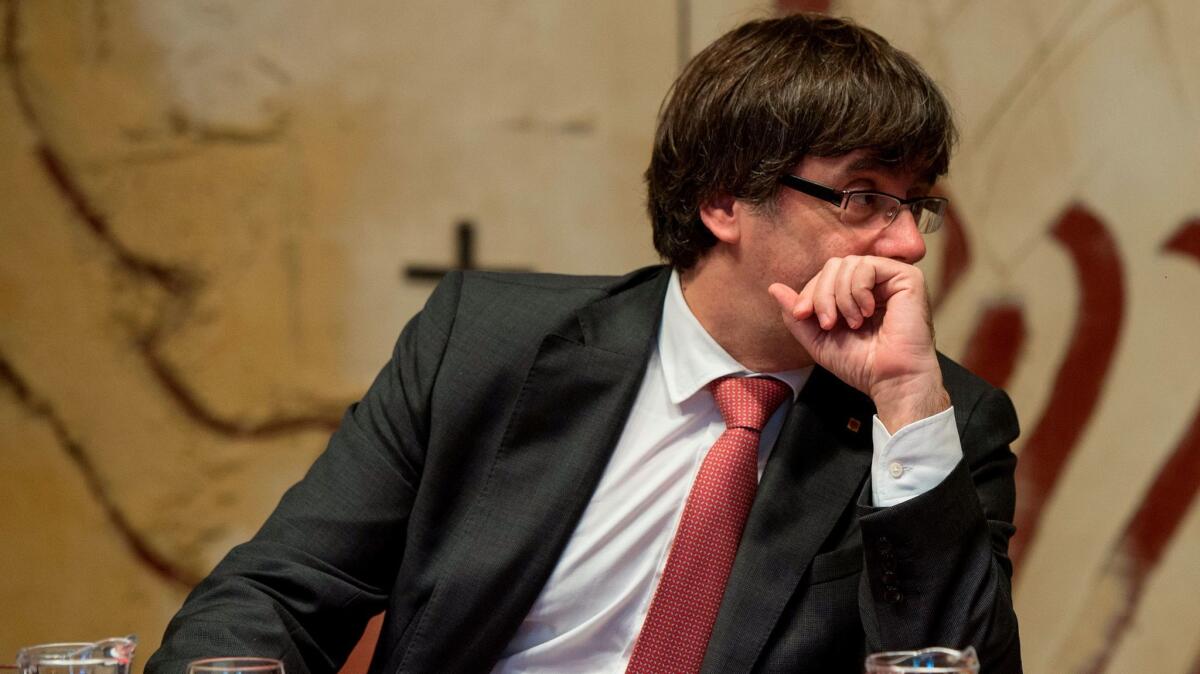 Carles Puigdemont, leader of the Catalan separatist movement, chairs a regional government meeting in Barcelona on Oct. 24, 2017.