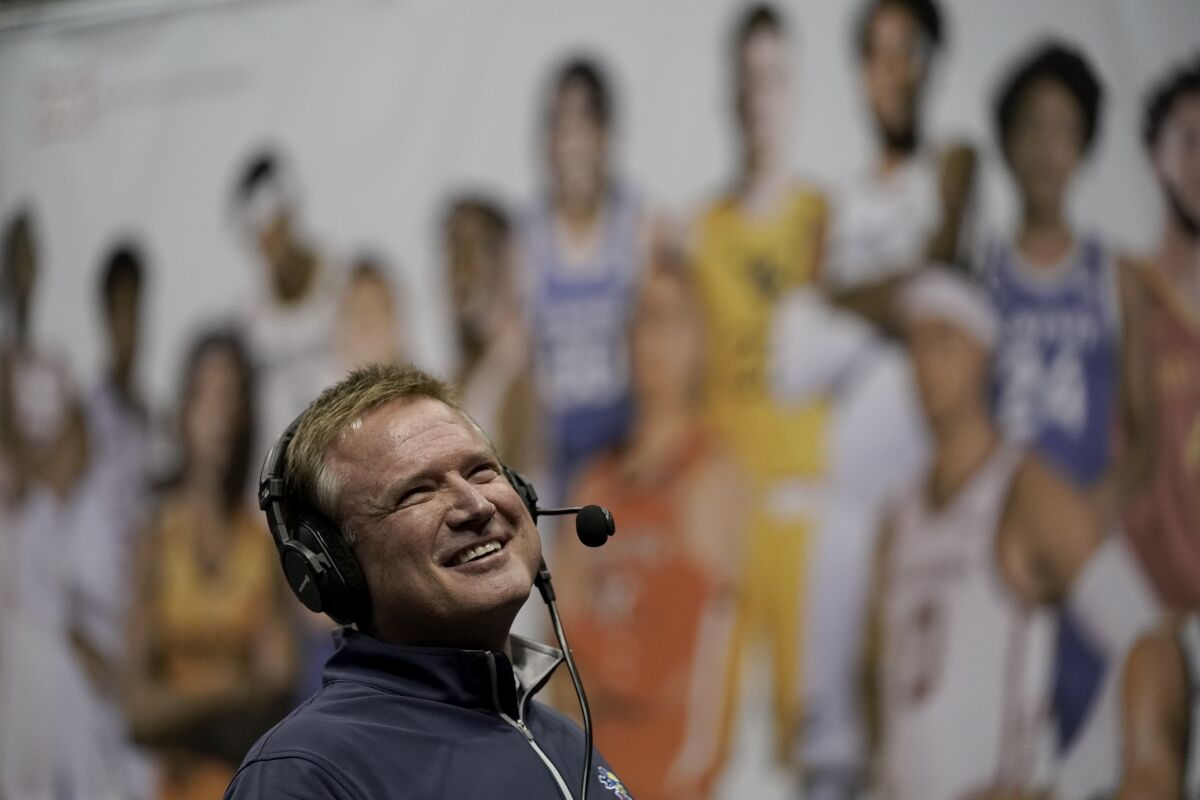 Kansas coach Bill Self does an interview during Big 12 NCAA college basketball media day Wednesday, Oct. 20, 2021, in Kansas City, Mo. (AP Photo/Charlie Riedel)