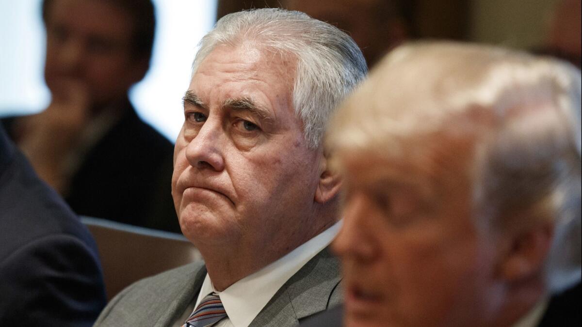 Secretary of State Rex Tillerson listens as President Donald Trump speaks during a cabinet meeting at the White House in Washington on Jan. 10.