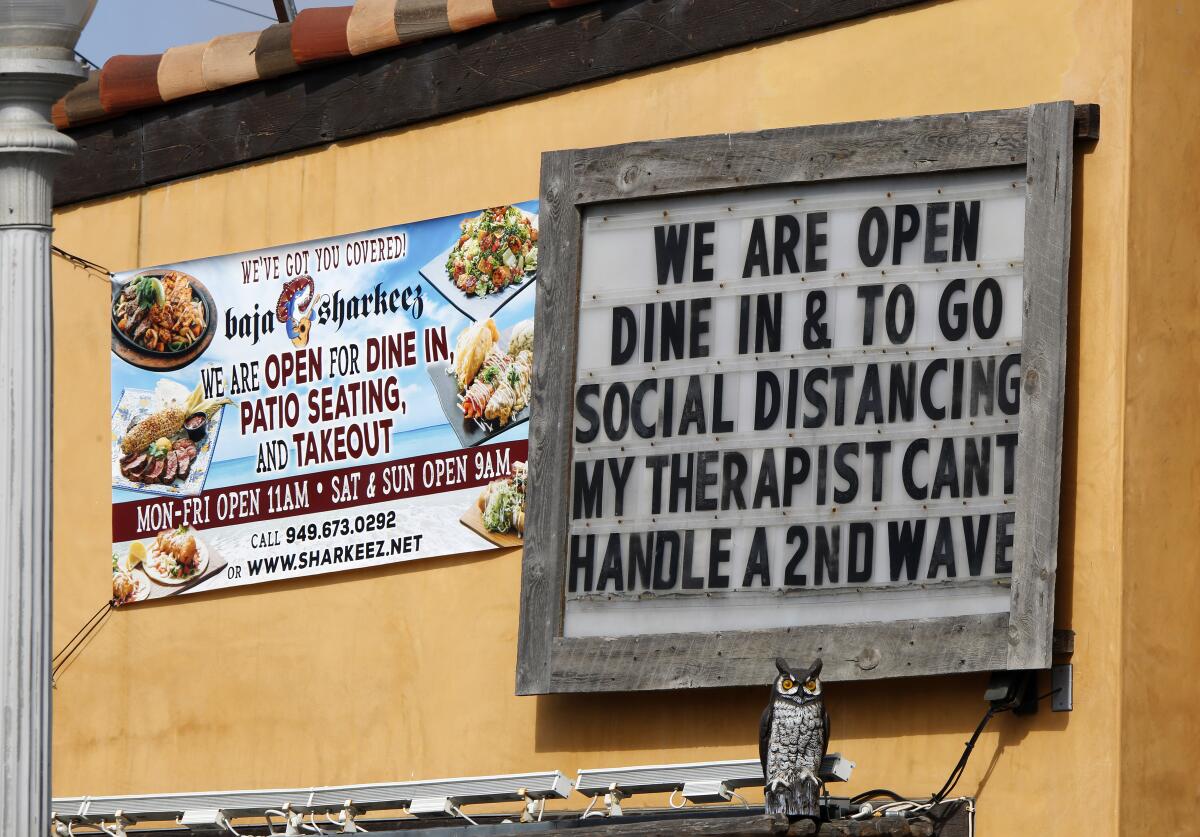 A sign at Baja Sharkeez at the Newport Pier in Newport Beach.