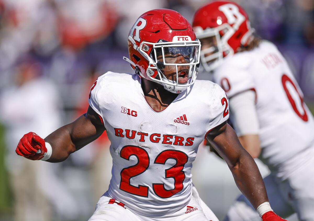 FILE - Rutgers running back Kyle Monangai (23) in action during the second half of an NCAA football game against Northwestern Wildcats in Evanston, Ill., Saturday, Oct. 16, 2021. Rutgers begins the season against Boston College on Sept. 3, 2022. (AP Photo/Kamil Krzaczynski, File)