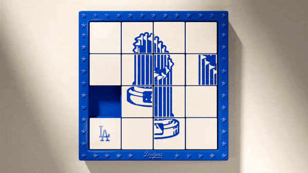 Animated graphic of a slide puzzle featuring the World Series trophy in Dodgers colors