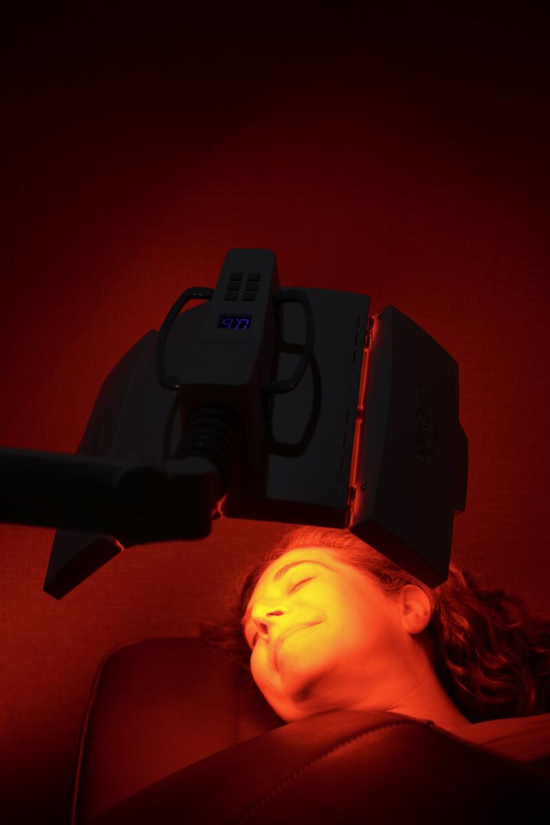 A red light lamp offers the author collagen stimulation.