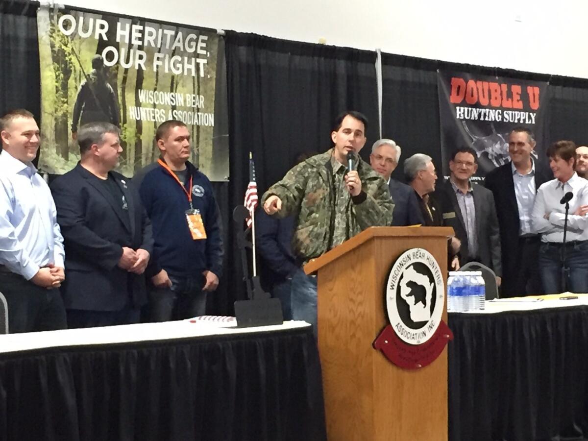 Gov. Scott Walker, addressing a bear hunter convention in Rothschild, Wis., said Ted Cruz's political organization will help him secure more delegates than Donald Trump to win the Republican presidential nomination.