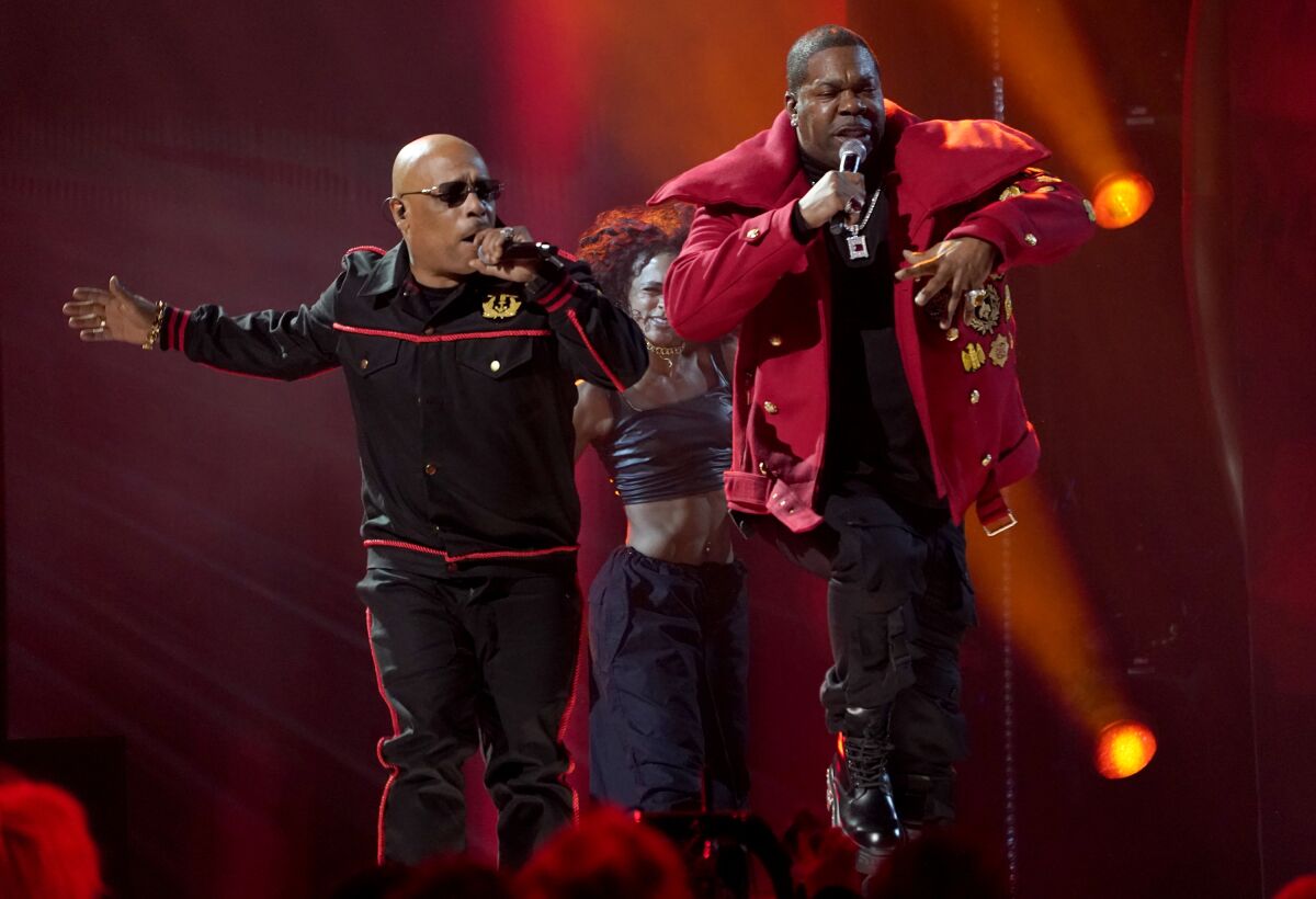 Spliff Star, left, and Busta Rhymes perform "Put Your Hands Where My Eyes Could See" at the 65th annual Grammy Awards on Sunday, Feb. 5, 2023, in Los Angeles. (AP Photo/Chris Pizzello)
