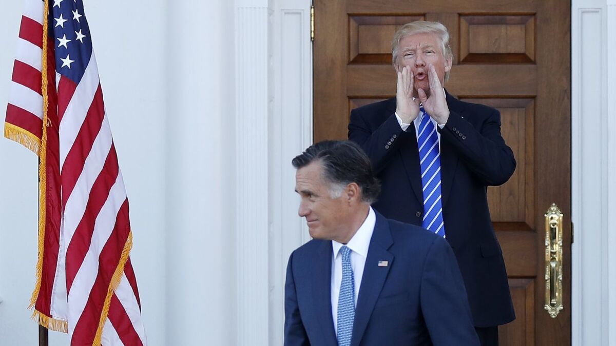 Mitt Romney leaves Donald Trump's New Jersey golf club as the president-elect calls out to the media after Romney and Trump's November 2016 meeting.