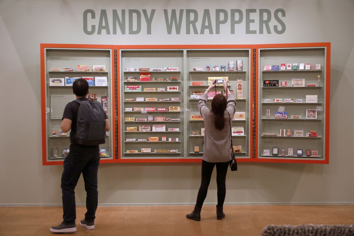 Candy wrappers on loan from the Candy Wrapper Museum, a collection by Darlene Lacey, on display at the "21 Collections: Every Object Has a Story" exhibit in the Getty Gallery at the Central Library in Los Angeles.