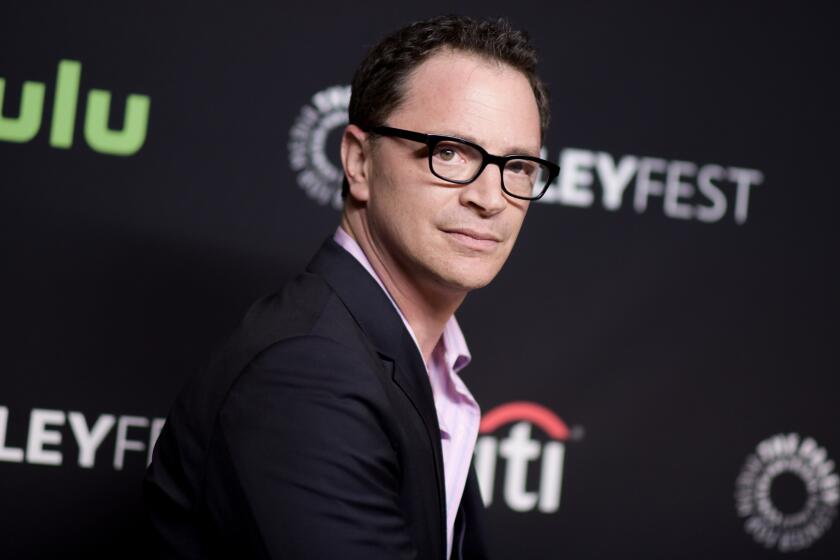 Joshua Malina, shown this week arriving for a "Scandal" panel at Paleyfest in Los Angeles, will cohost a new podcast about another show he was in, "The West Wing."