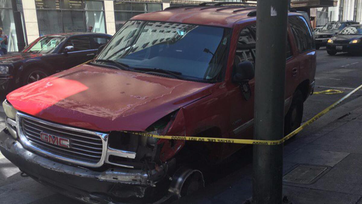 Suspects abandoned their car on 5th and Broadway in downtown L.A. after leading police on a pursuit.