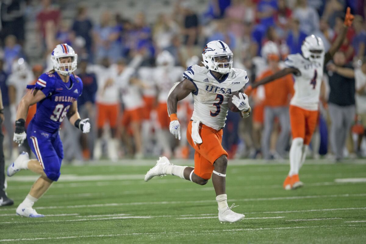 UTSA running back Sincere McCormick (3) heads to end zone to score a touchdown in the second half of an NCAA college football game against Louisiana Tech in Ruston, La., Saturday, Oct. 23, 2021. (AP Photo/Matthew Hinton)