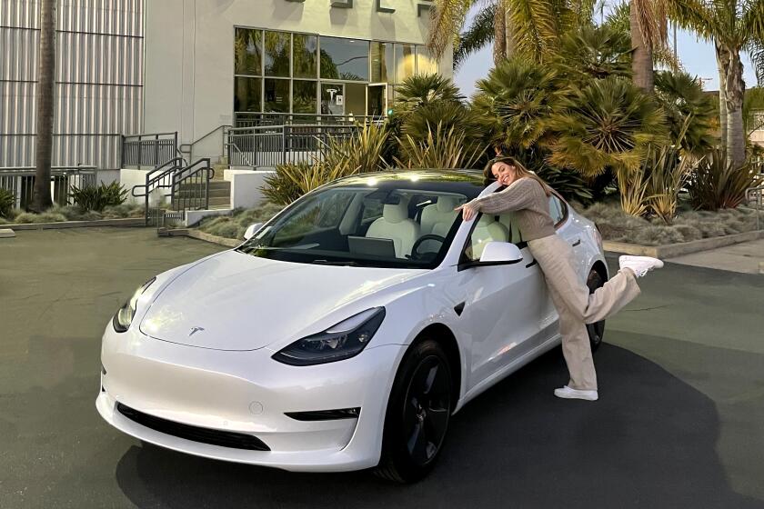 Ariana Escalante, on the day she took delivery of her Tesla Model 3 long range; purchased, not leased. 