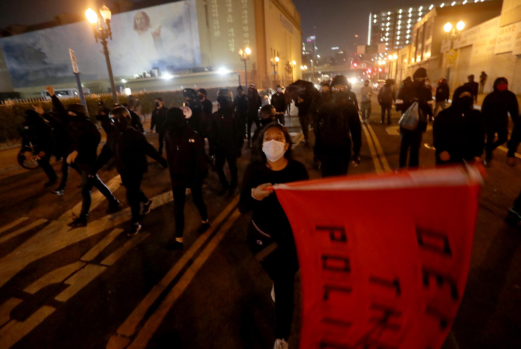 Protesters march in downtown Los Angeles on Tuesday night.