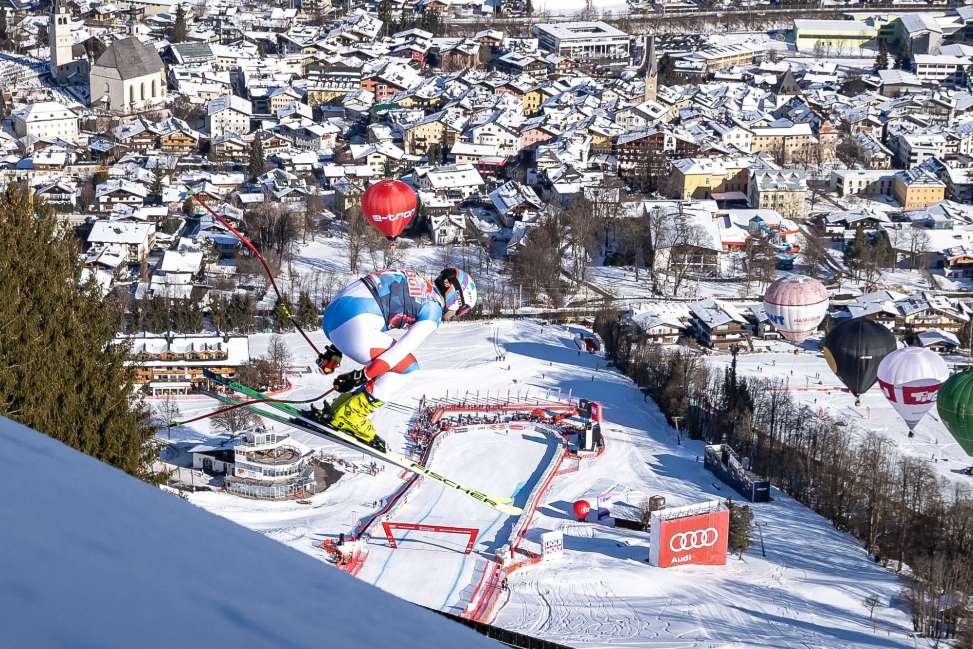 Urs Kryenbuehl of Switzerland goes over a final jump