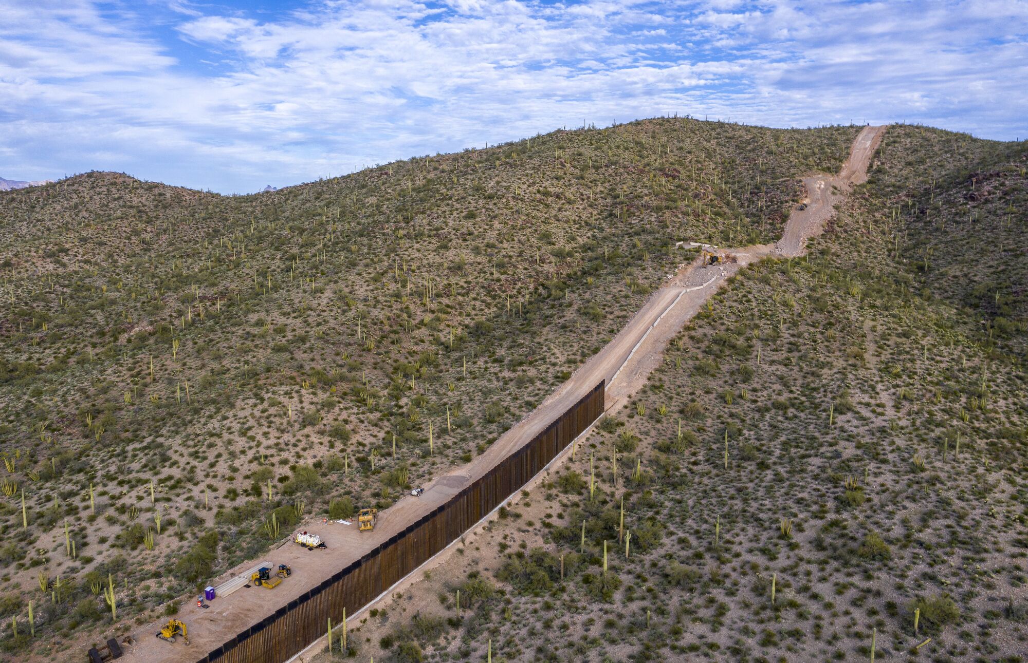 Border fence construction is underway in Arizona, blasting through sites like Monument Hill.