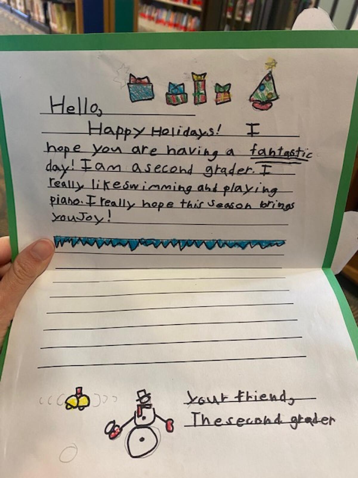 This message from a second-grader was among those collected during the La Jolla/Riford Library's holiday card drive.
