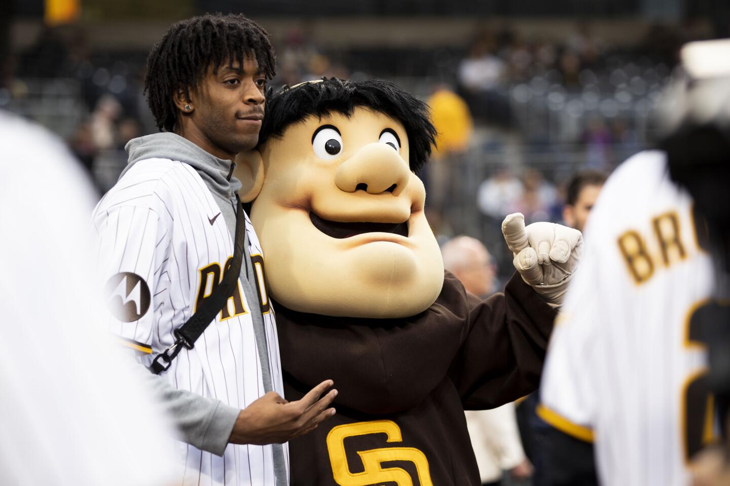 Brian Dutcher, Lamont Butler throw out first pitch at Padres game