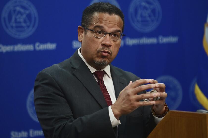 FILE - In this Wednesday, May 27, 2020, file photo, Minnesota Attorney General Keith Ellison answers questions during a news conference in St. Paul, Minn., about the investigation into the death of George Floyd, who died May 25, while in the custody of Minneapolis police officers. Minnesota Gov. Tim Walz said Sunday, May 31, that he decided Ellison needs to lead the case. (John Autey/Pioneer Press via AP, Pool, File)