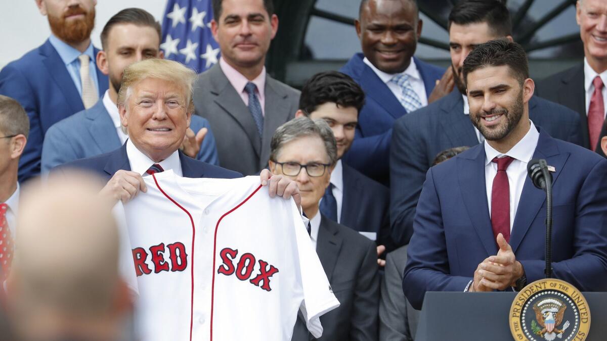 President Trump meets with some members of the Boston Red Sox on the South Lawn of the White House last week.