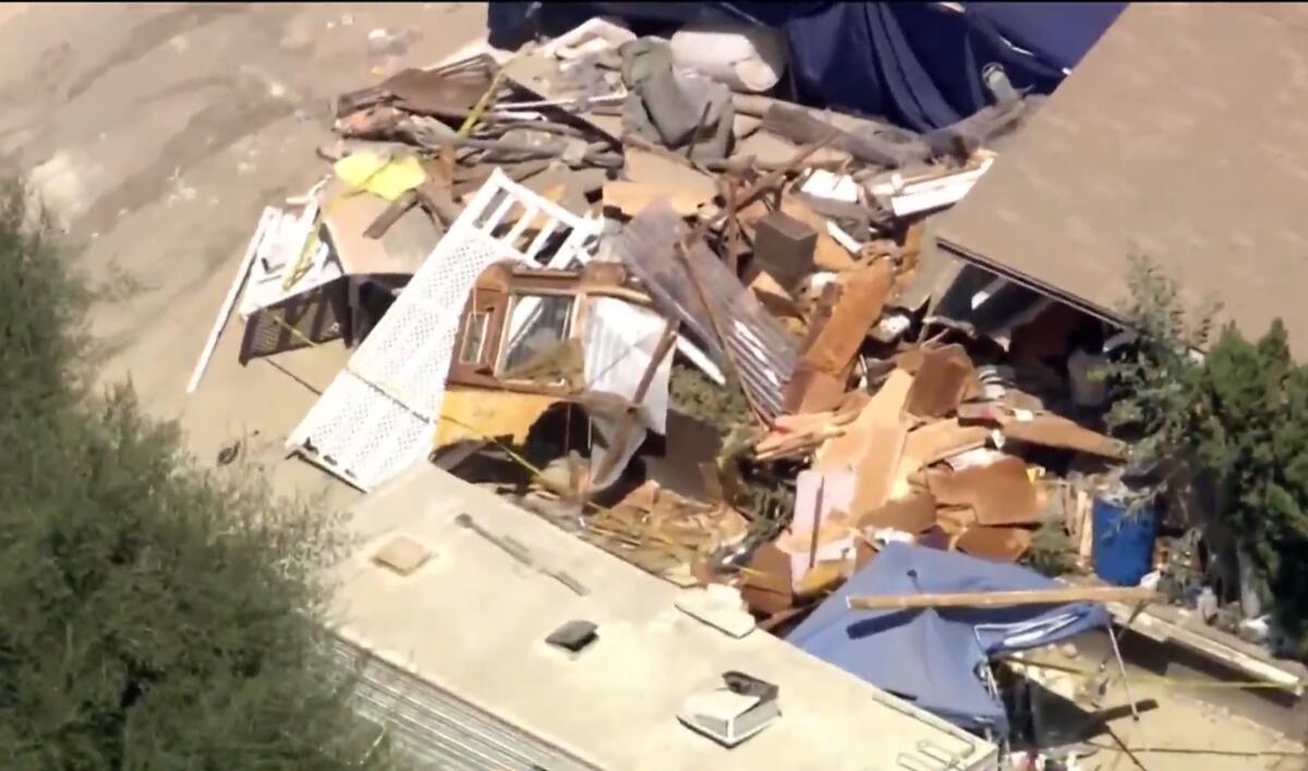 The destroyed house of Michael Royce Sparks, where human remains were found, in Colton.