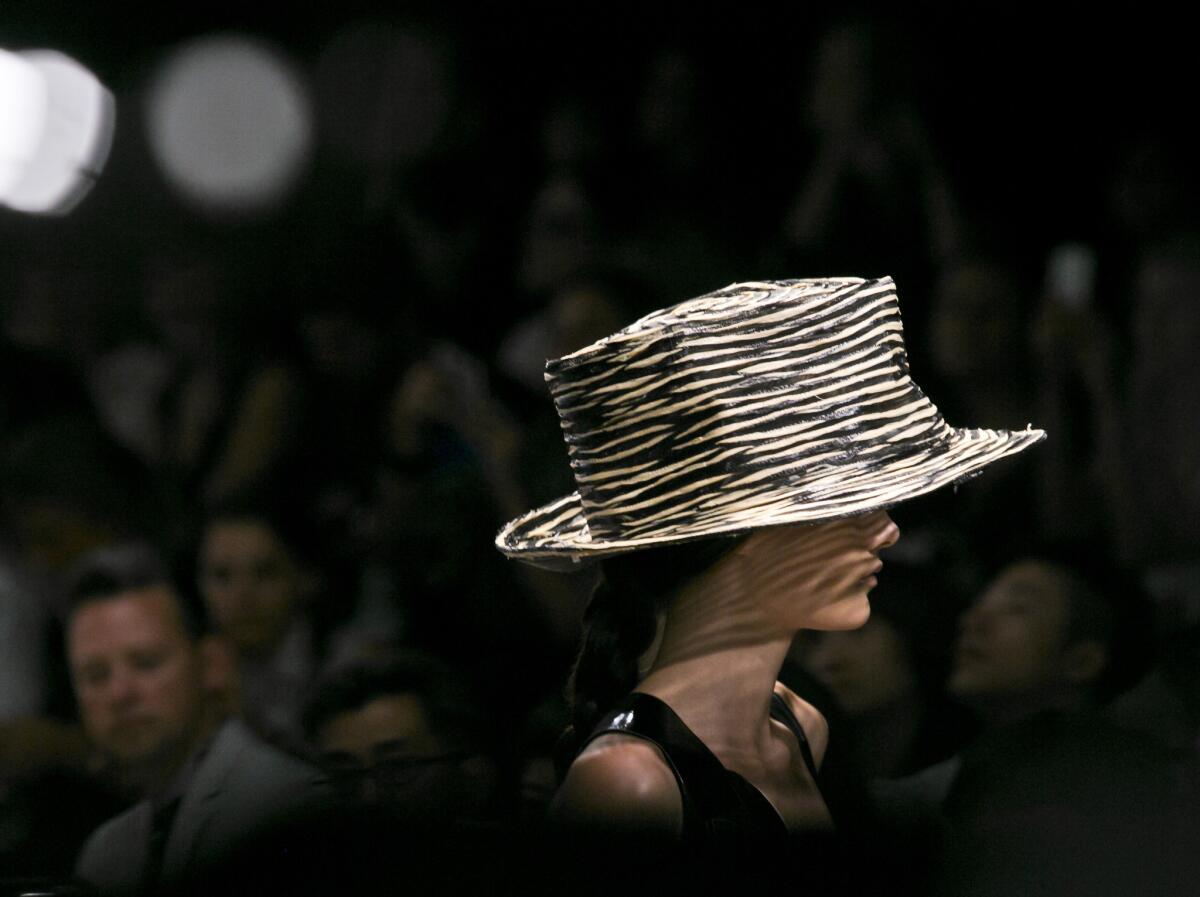 Large hats by Stephen Jones were prominently featured in Donna Karan's spring/summer 2015 collection during New York Fashion Week.