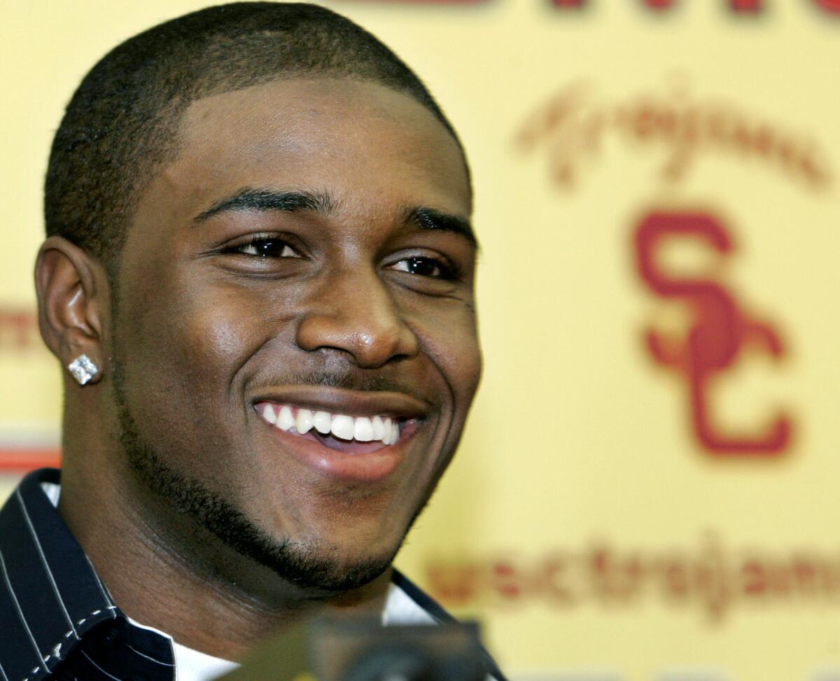 USC was sanctioned for what the NCAA found to be a "lack of institutional control" mainly related to extra benefits received by former football player Reggie Bush, pictured, as well as basketball player O.J. Mayo.