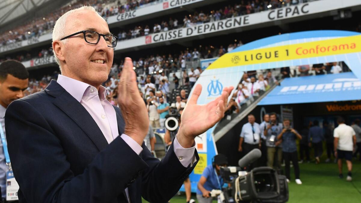 Frank McCourt applauds as he attends a French soccer league match between Olympique de Marseille and Toulouse at Stade Vélodrome, in Marseille, France, in August 2016.
