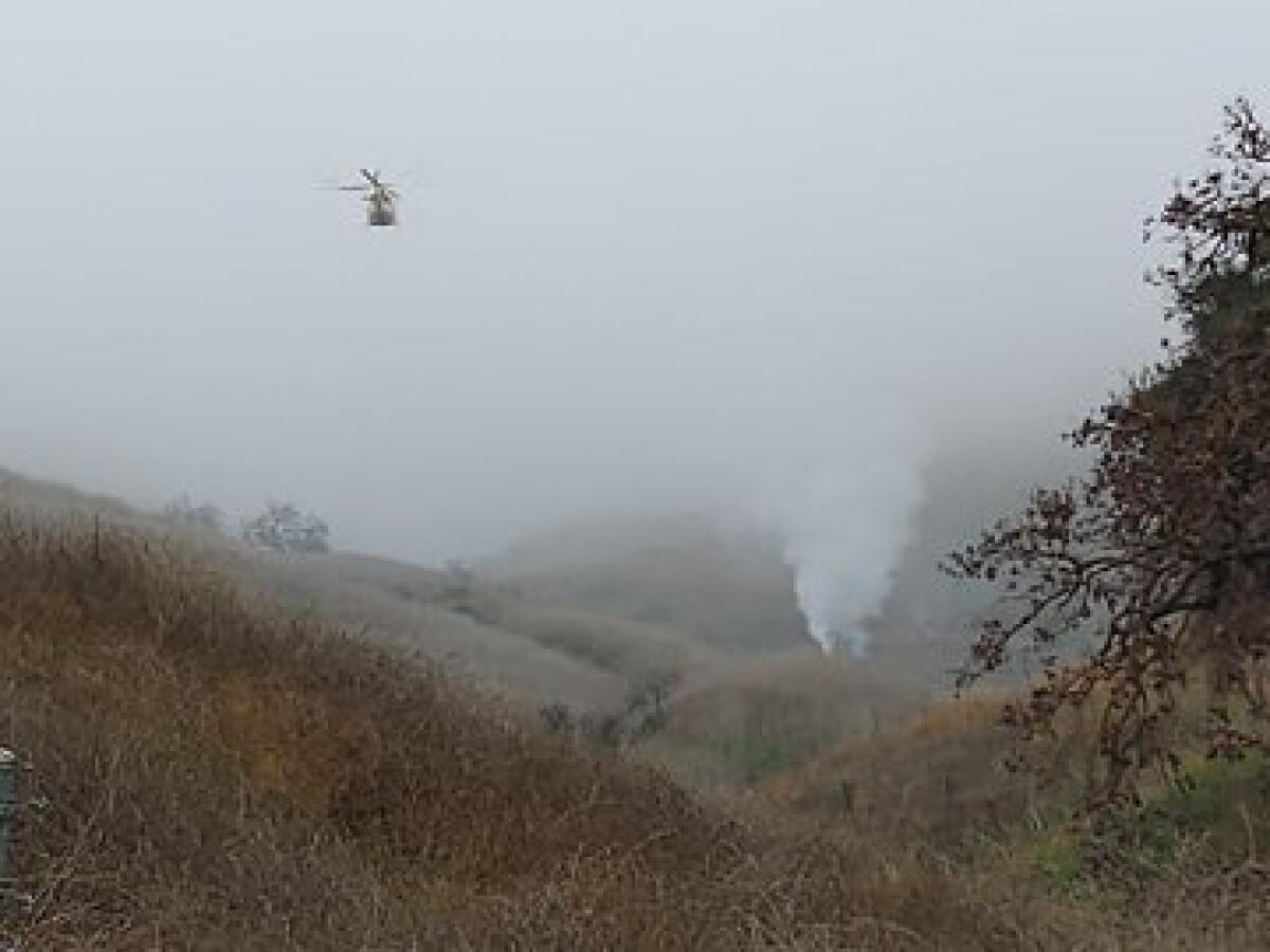 CALABASAS, CA - JANUARY 26: In this handout photo provided by the Los Angeles Sheriffs Department, emergency crews respond to a helicopter crash that reportedly killed former NBA player Kobe Bryant on January 26, 2020 in Calabasas, California. Five people have been confirmed dead in the crash in the Calabasas hills, among them former NBA star of the Los Angeles Lakers Kobe Bryant. (Photo by LASD via Getty Images) *** BESTPIX *** ** OUTS - ELSENT, FPG, CM - OUTS * NM, PH, VA if sourced by CT, LA or MoD **