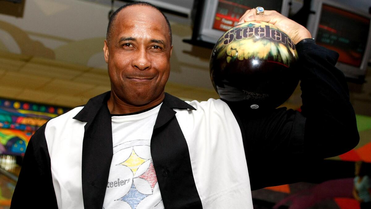 Pro Football Hall of Famer Lynn Swann sports a Steelers bowling ball during a Super Bowl celebrity bowlling event on Jan. 28, 2009 in Tampa, Fla.