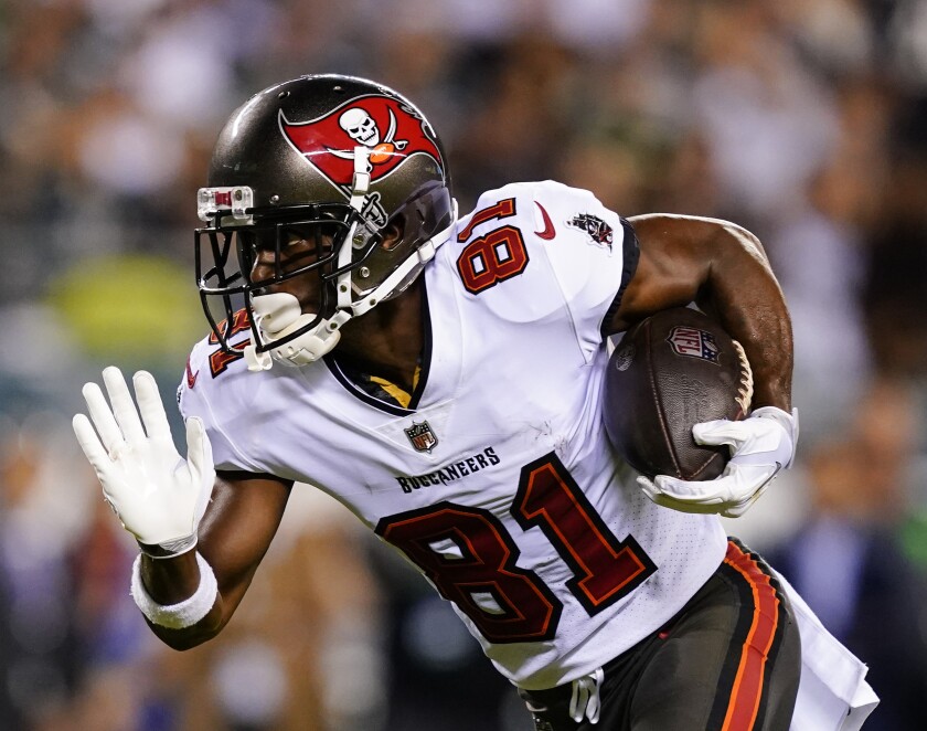 Tampa Bay Buccaneers wide receiver Antonio Brown runs with the ball.