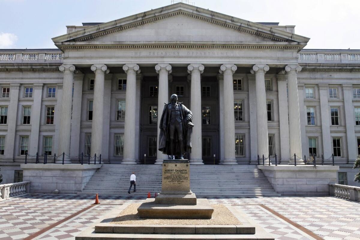 The statue of former Treasury Secretary Albert Gallatin outside the Treasury Building in Washington. The department said Wednesday it expected the U.S. to hit its debt limit again by the end of the year.