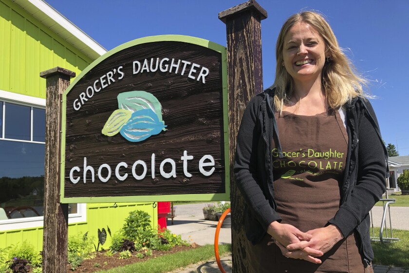 Jody Hayden, co-owner of Grocer's Daughter chocolate shop in Empire, Mich., said she will ask customers to wear masks. 